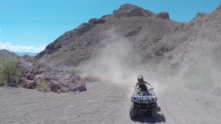 ATV riders crossing the desert near the Grand Canyon on a GC Flight combo tour