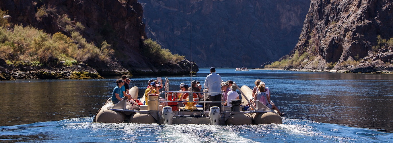 River raft floating the Colorado River through the Grand Canyon